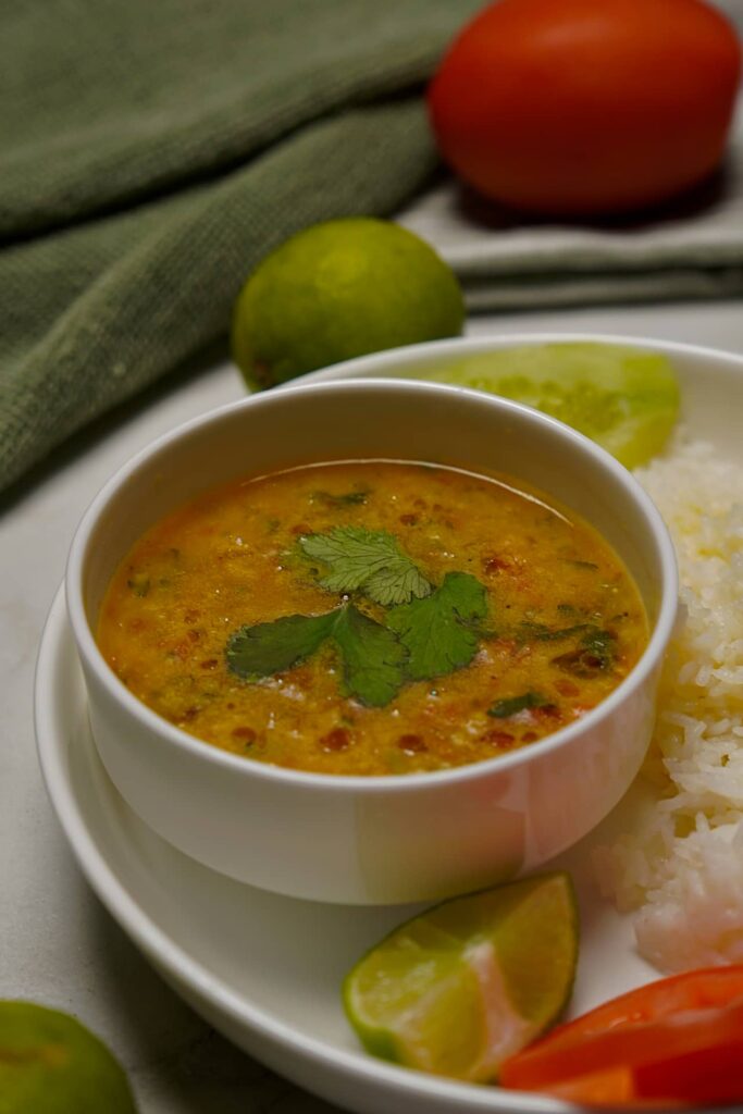 Jeera Tadka Wali Dal served in a bowl, showcasing its rich color and texture.
