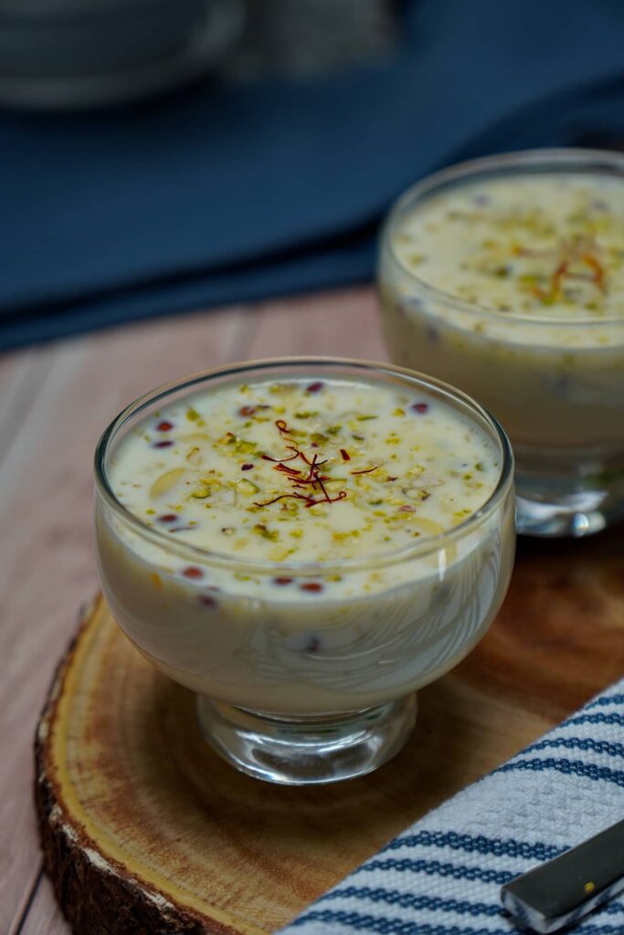 Sabudana Kheer topped with cashews, almonds, and saffron served in an elegant bowl.